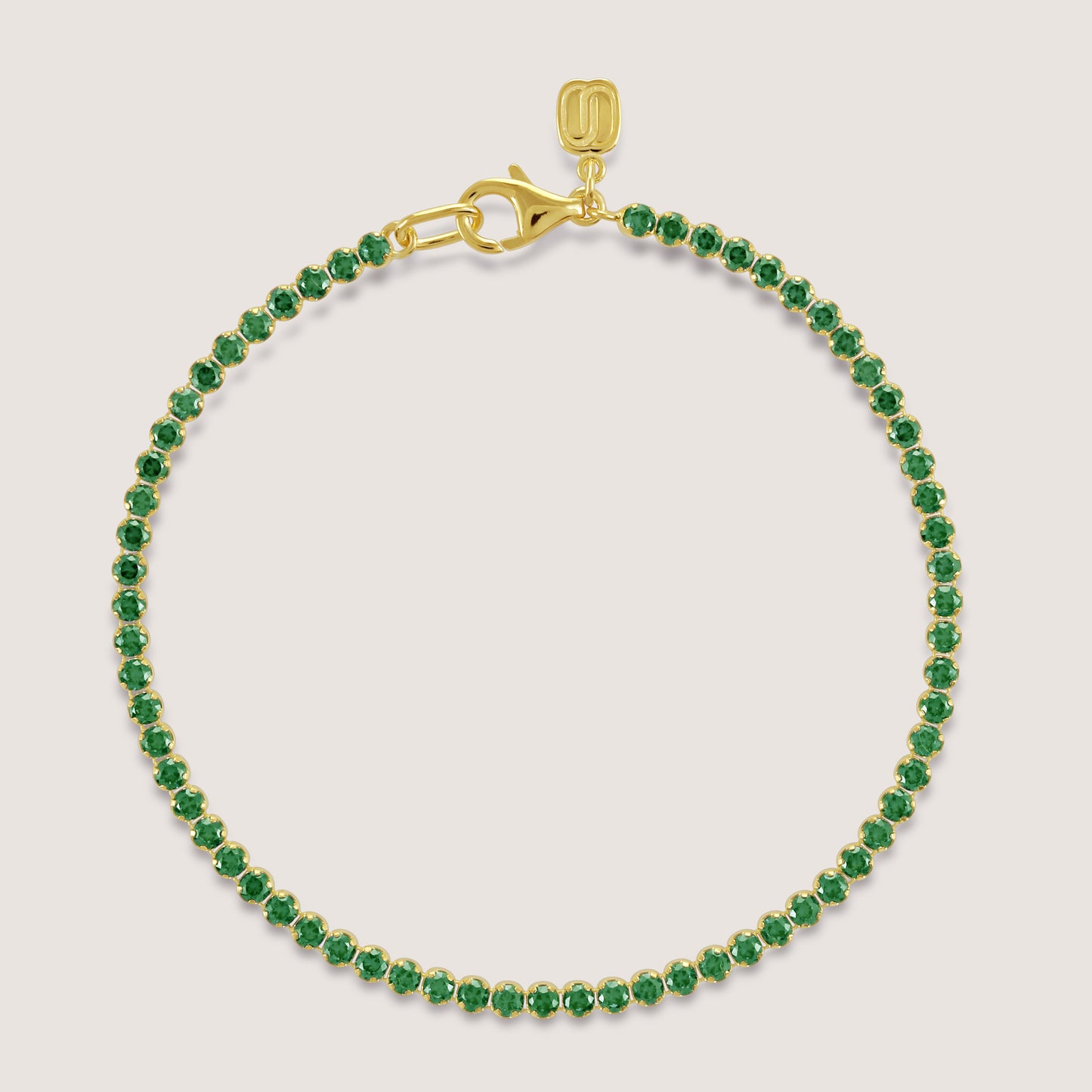 White Background - Front of KiraKira Tennis Bracelet Green | 925 Silver Gold Plated from Nishani’s Kira Kira festive collection — handcrafted bracelet in gold-plated 925 silver.