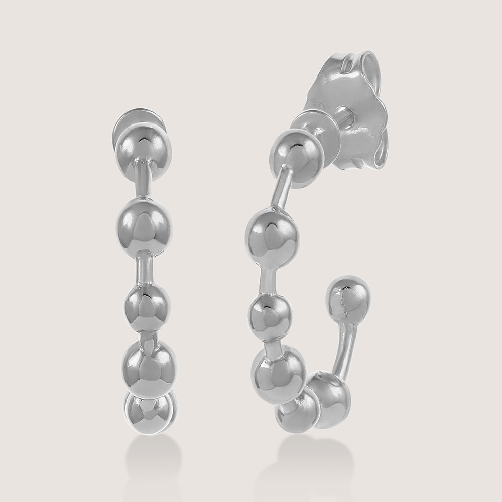 White Background - Front of Ukiyo Ball Hoops — a minimal, rhodium-plated 925 silver design crafted for everyday wear from Nishani’s Ukiyo collection.