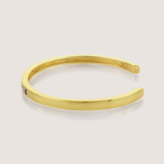 White Background - Side of KiraKira Multi-Colour Cuff | 925 Silver Gold-Plated CZ from Nishani’s Kira Kira festive collection — handcrafted multicolour stones jewelry, bracelet in gold-plated 925 silver.