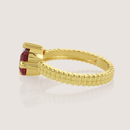 White Background - Side of KiraKira Ruby Suits Ring | 925 Silver Gold-Plated from Nishani’s Kira Kira festive collection — handcrafted ruby jewelry, ring in gold-plated 925 silver.
