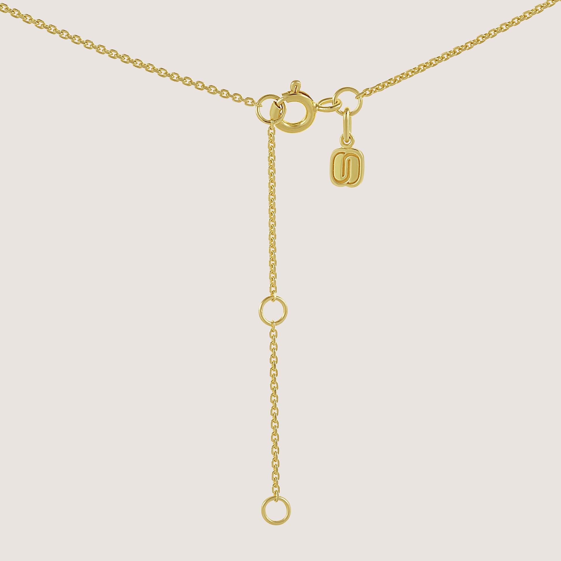 White Background - back of KiraKira Ruby Suits Necklace | 925 Silver Gold-Plated from Nishani’s Kira Kira festive collection — handcrafted ruby jewelry, necklace in gold-plated 925 silver.