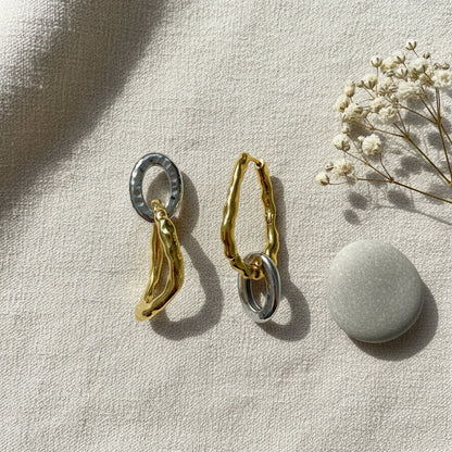 Yugen Asymmetrical Earrings – highlighting its bold dual-tone sophistication, part of Nishani’s Yugen Collection.