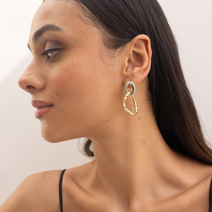 Yugen Asymmetrical Earrings – highlighting its bold dual-tone sophistication, part of Nishani’s Yugen Collection.