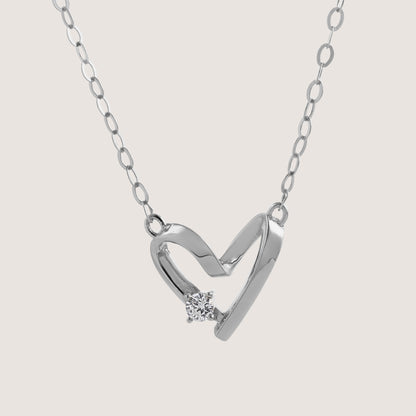 diamond heart necklace crafted in 925 sterling silver, available in gold and rhodium-plated finish