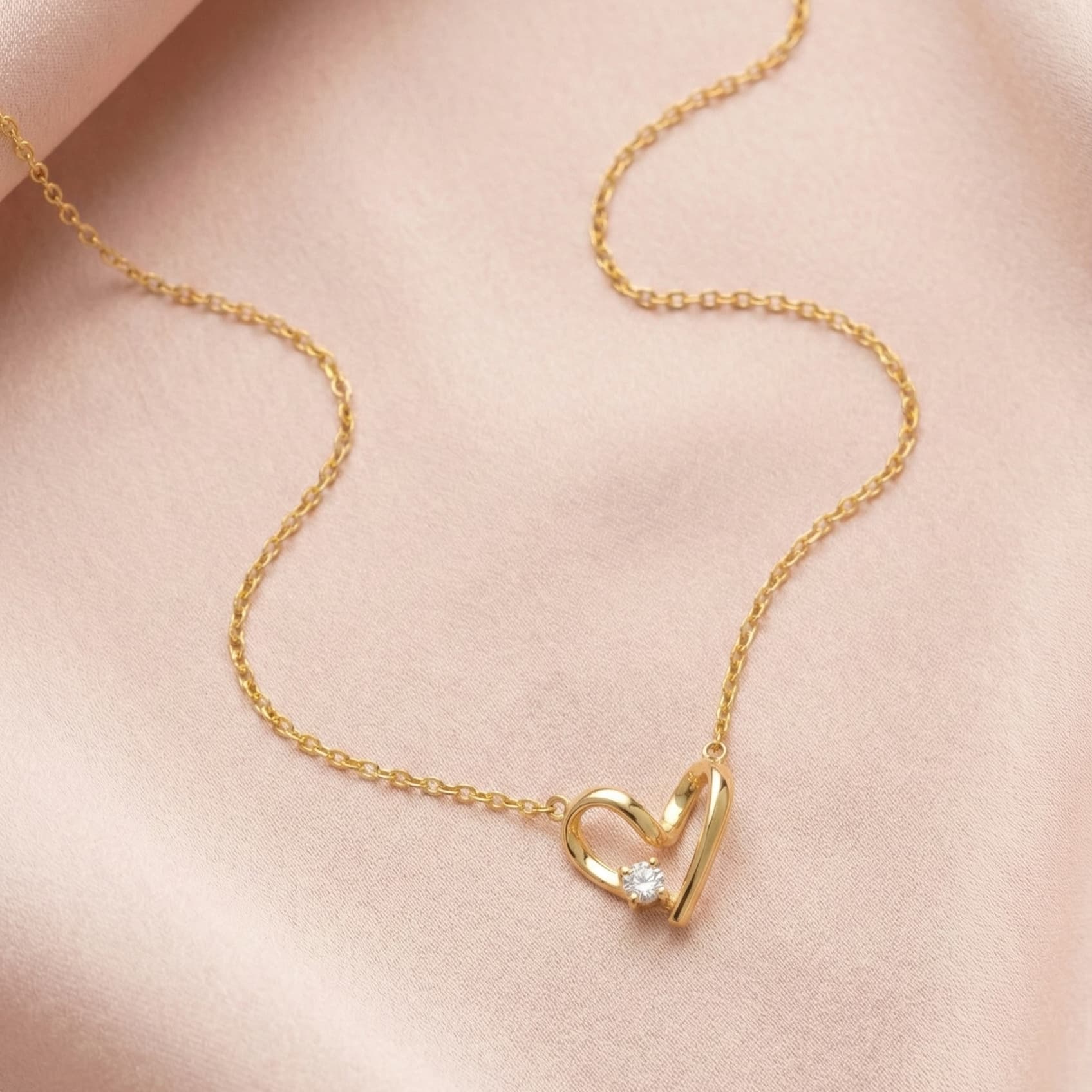 diamond heart necklace crafted in 925 sterling silver, available in gold and rhodium-plated finish