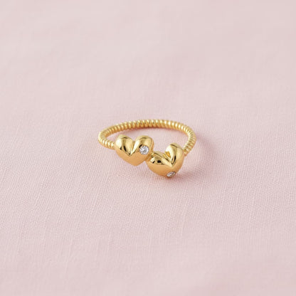double heart ring crafted in 925 sterling silver, available in gold and rhodium-plated finish