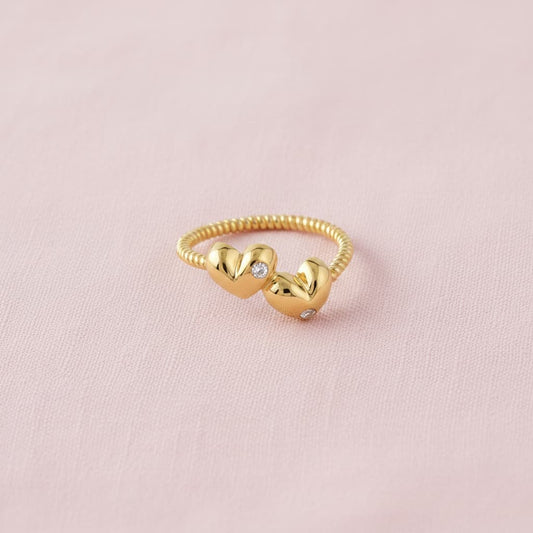 double heart ring crafted in 925 sterling silver, available in gold and rhodium-plated finish