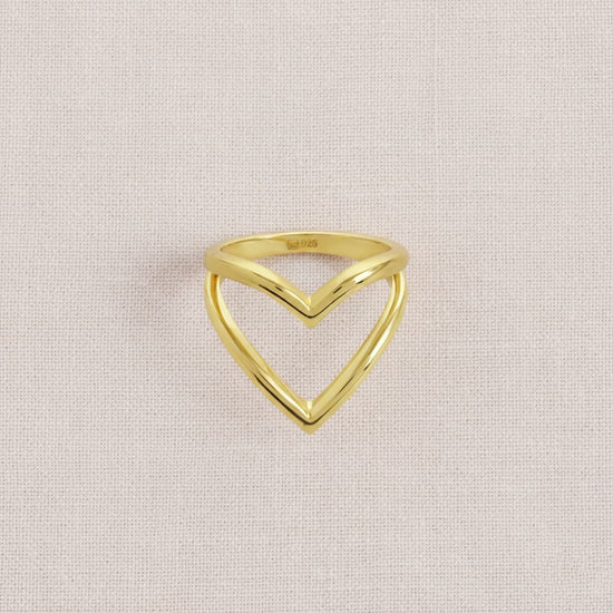 dual heart ring crafted in 925 sterling silver, available in gold and rhodium-plated finish