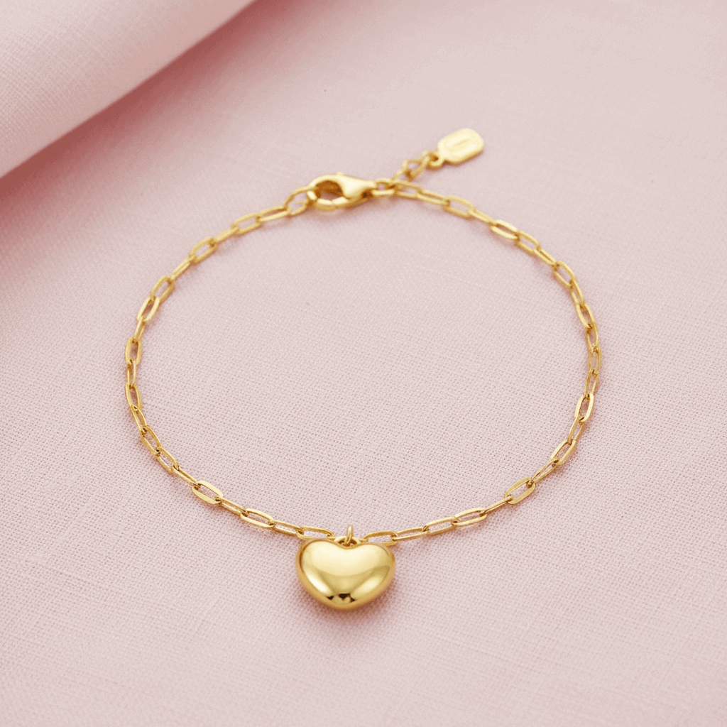 heart charm bracelet crafted in 925 sterling silver, available in gold and rhodium-plated finish