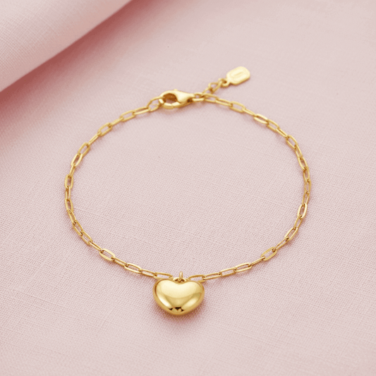 heart charm bracelet crafted in 925 sterling silver, available in gold and rhodium-plated finish
