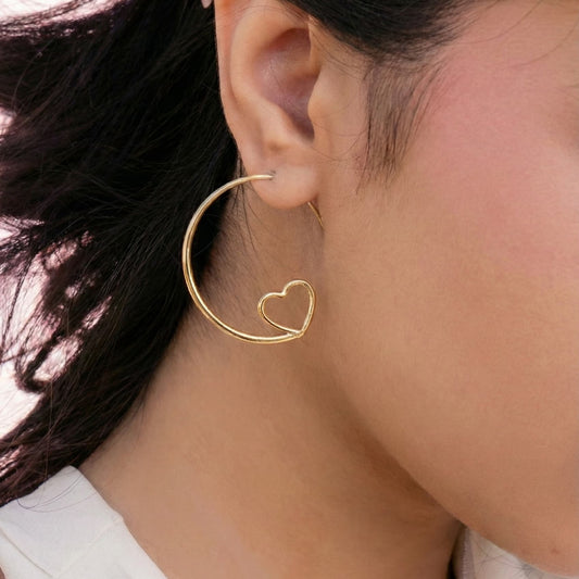 heart spiral hoop earrings crafted in 925 sterling silver, available in gold and rhodium-plated finish, featuring a romantic heart-inspired design