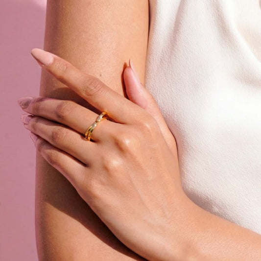 intertwined heart ring crafted in 925 sterling silver, available in gold and rhodium-plated finish