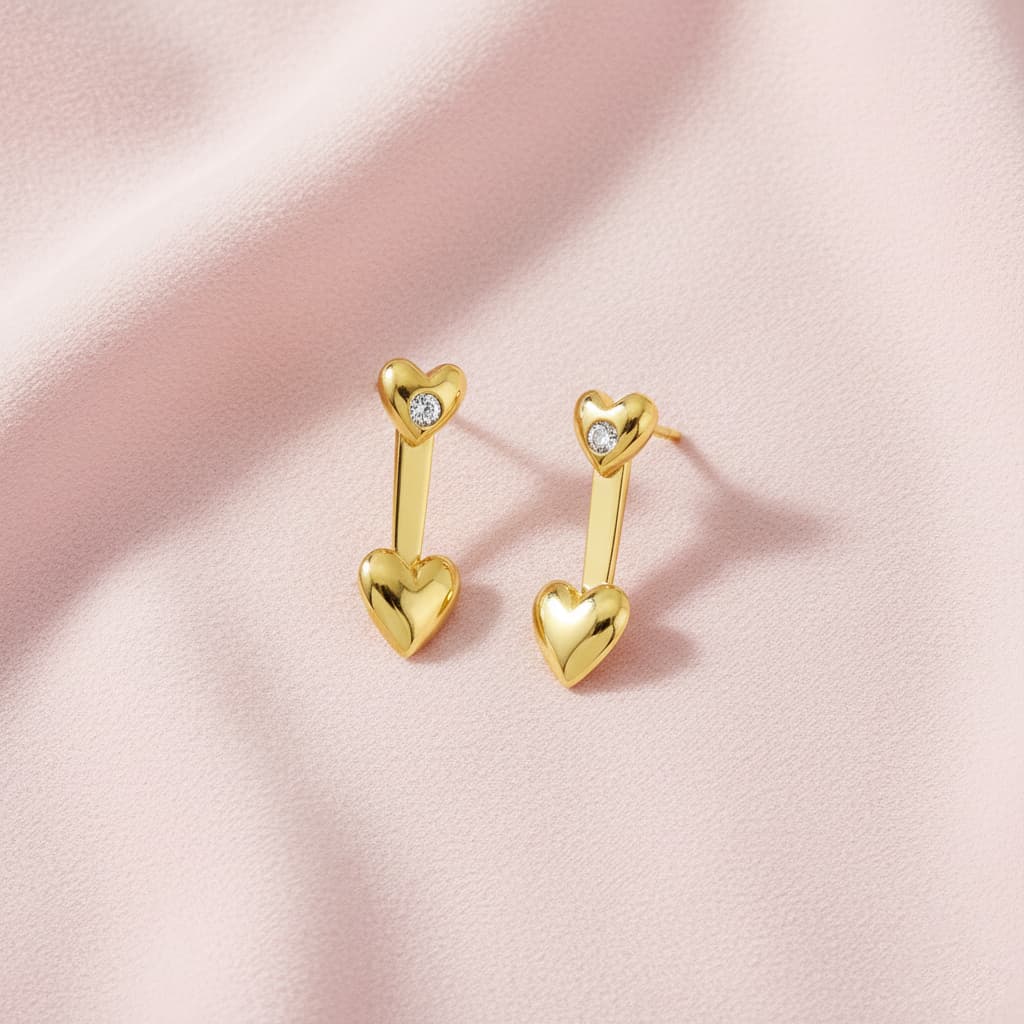 minimal heart earrings crafted in 925 sterling silver, available in gold and rhodium-plated finish, featuring a romantic heart-inspired design