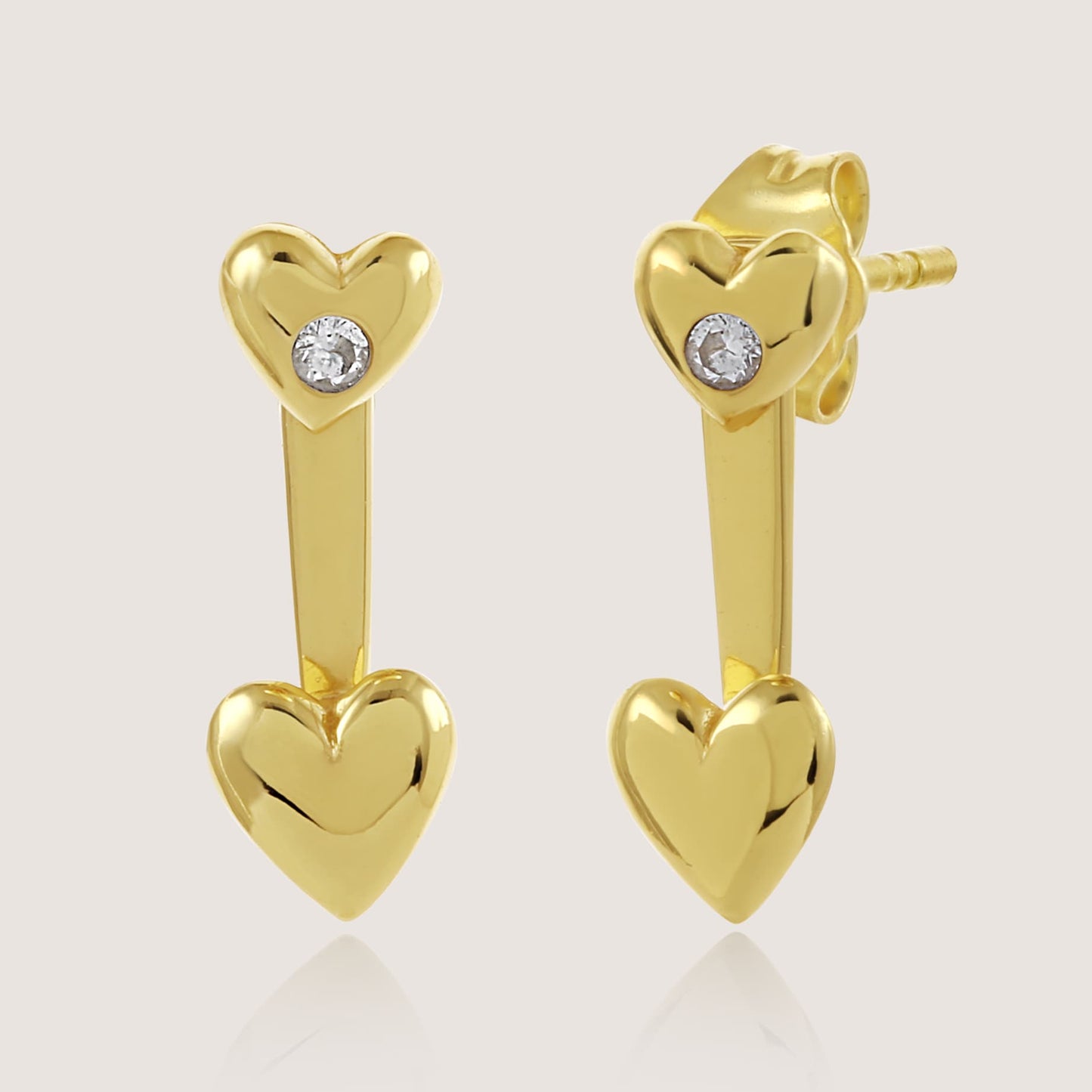 minimal heart earrings crafted in 925 sterling silver, available in gold and rhodium-plated finish, featuring a romantic heart-inspired design