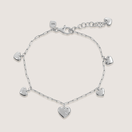multi heart charm bracelet crafted in 925 sterling silver, available in gold and rhodium-plated finish