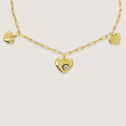multi heart charm bracelet crafted in 925 sterling silver, available in gold and rhodium-plated finish