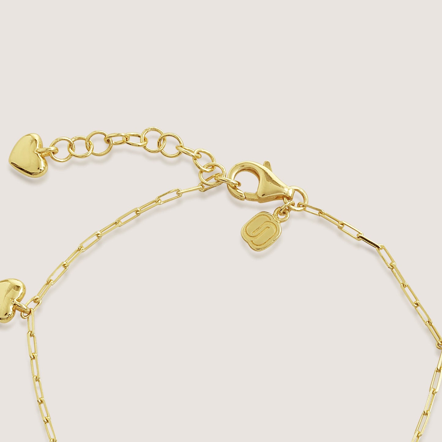 multi heart charm bracelet crafted in 925 sterling silver, available in gold and rhodium-plated finish
