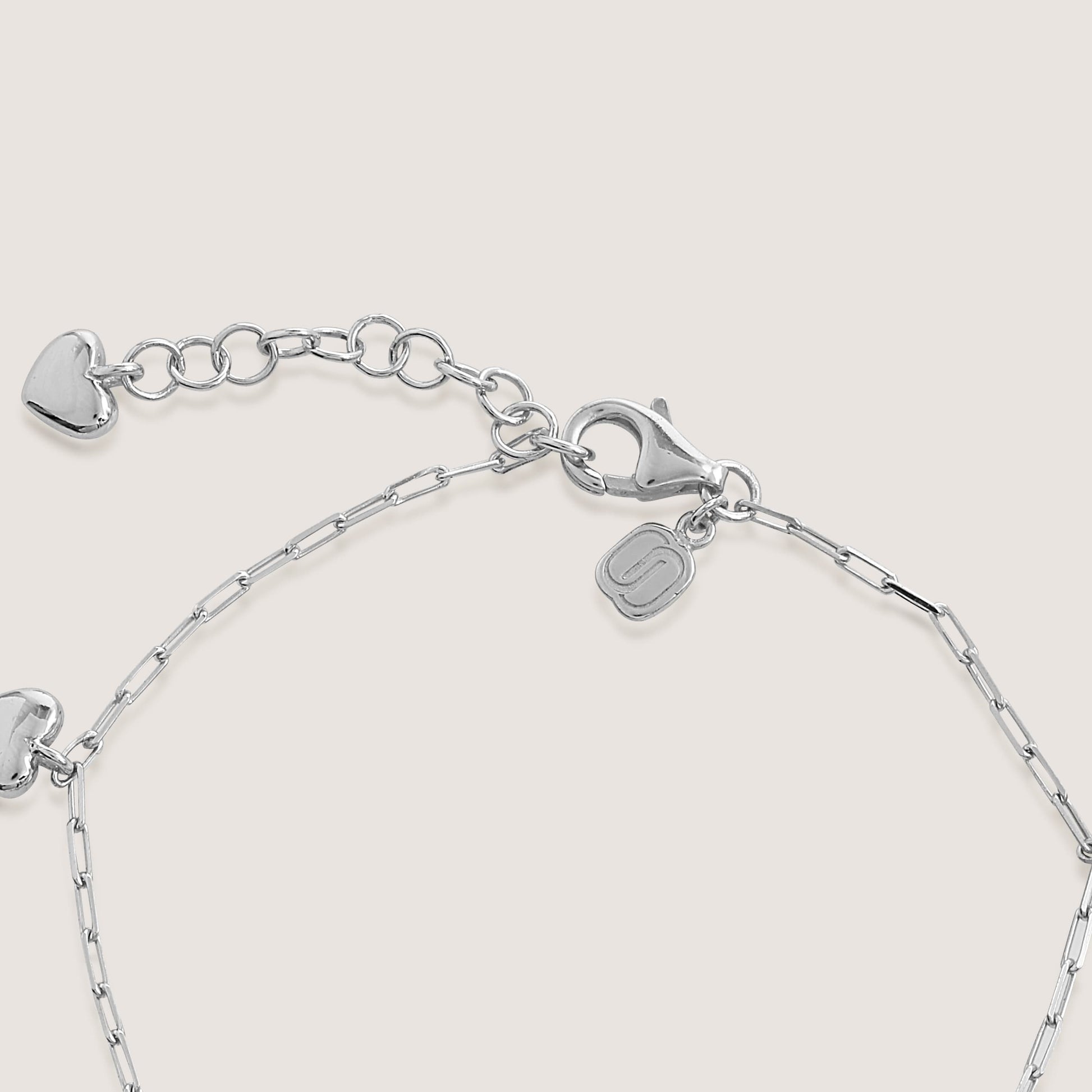 multi heart charm bracelet crafted in 925 sterling silver, available in gold and rhodium-plated finish