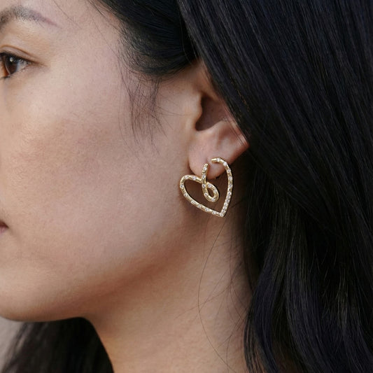 open heart earrings crafted in 925 sterling silver, available in gold and rhodium-plated finish, featuring a romantic heart-inspired design