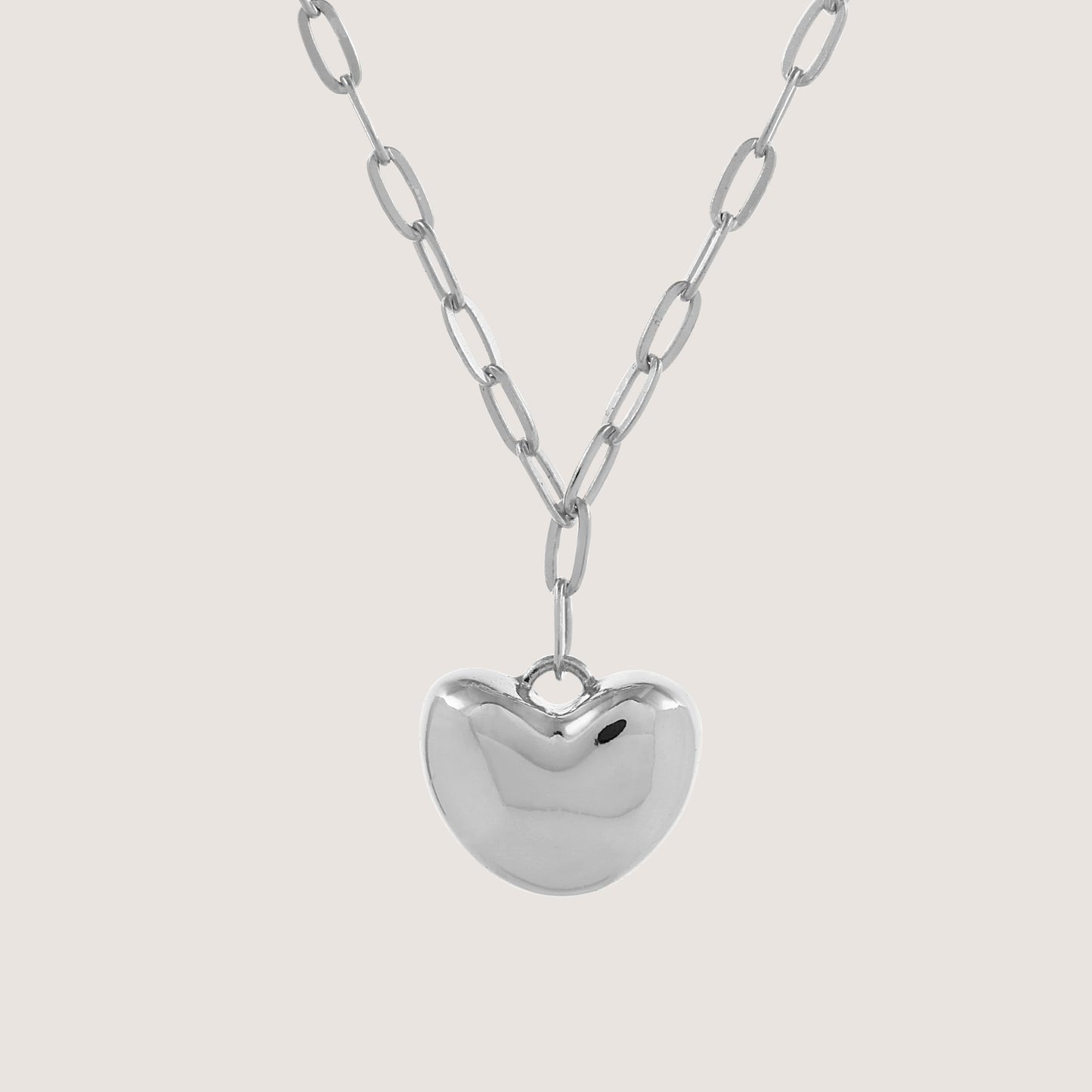 puffed heart necklace crafted in 925 sterling silver, available in gold and rhodium-plated finish