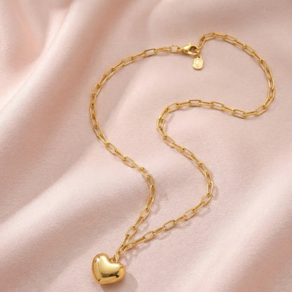 puffed heart necklace crafted in 925 sterling silver, available in gold and rhodium-plated finish